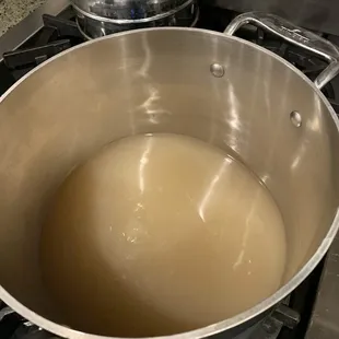 Look how cloudy and yellow/brown this broth is.  That's not pho.