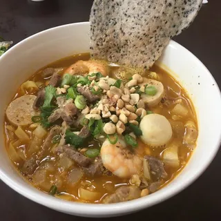 23. M Qung (turmeric noodles)