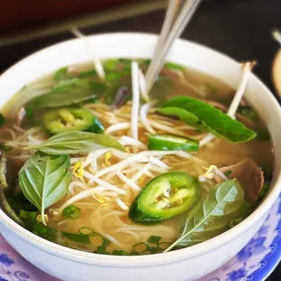 a bowl of soup on a plate