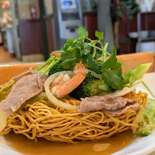 Stir-fried Egg Noodles with Mixed Vegetables, Tofu, and Mushroom (Mì Xaò Chay, $14)