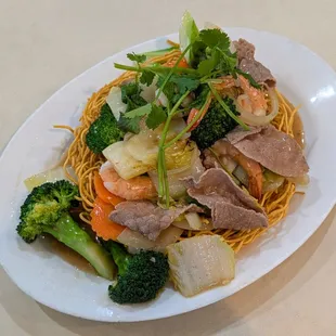 Stir-fried Egg Noodles with Mixed Vegetables, Tofu, and Mushroom (Mì Xaò Chay, $14)