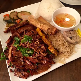 M5. Grilled Chicken, Beef, Pork, Egg Rolls, Egg Foo Young, Shrimp Cake and Shrimp over Rice