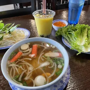 Seafood pho, egg rolls, mango boba