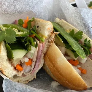 a sandwich with meat and vegetables