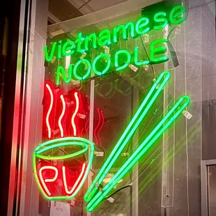 a neon sign for vietnamese noodles