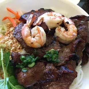 Bbq pork and grilled shrimp over vermicelli
