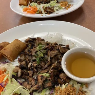 Vermicelli with pork and spring rolls