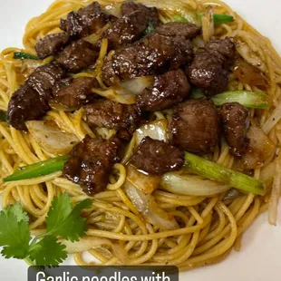 Garlic noodles with diced garlic steak