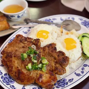 Pork chop and fried eggs