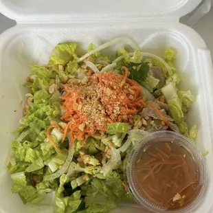 Beef salad with daikon radish, crushed peanuts , onions, carrots, nicely chopped lettuce , tender meat