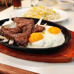 Sizzling Filet Mignon! Fried rice and egg.