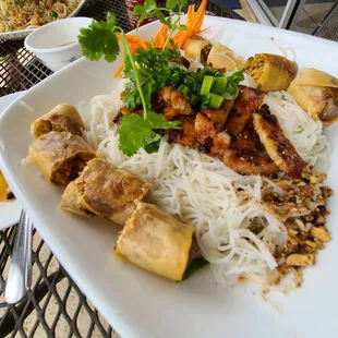 Vermicelli with chargrilled pork and egg rolls