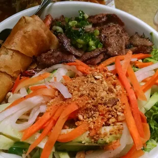 vermicelli noodles with charbroiled beef, veggies, egg roll, and 2 shrimps