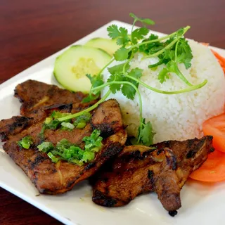 14. Charbroiled Pork Chop Over Rice with Salad
