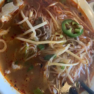 Small Pho with Rare beef, tripe and tendon.  I just had to add some condiments including extra chili oil!