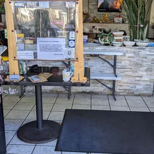 Order from the table in the doorway and pay first, then grab a table