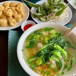 Egg noodle wanton soup with a side of crispy tofu bites, yum!