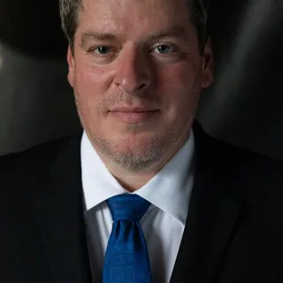 Curtis G.