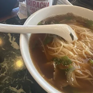 Brisket Pho small and sriracha sauce