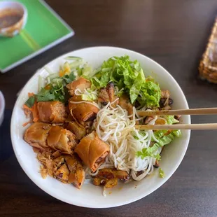 Charbroiled chicken and shrimp over vermicelli