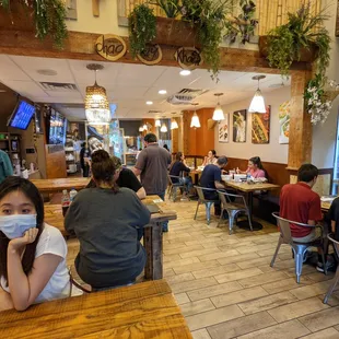 Inside. Dining room. This is most of the space. This is a fast-casual place where you order at the counter and food is brought to you.