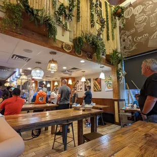 Inside. Dining room. This is most of the space. This is a fast-casual place where you order at the counter and food is brought to you.