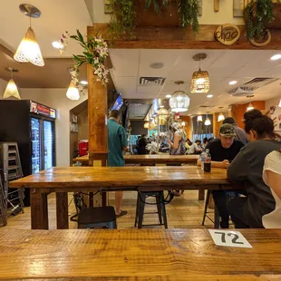 Inside. Dining room. This is a fast-casual place where you order at the counter and food is brought to you.