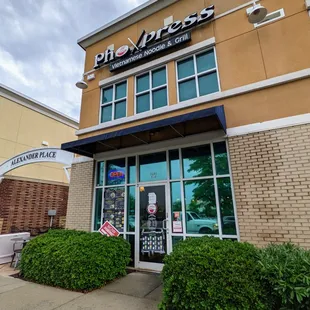 Outside. There are two storefronts. This one faces Walmart. Located in the Alexander Place shopping center.