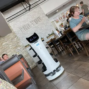 Robot waiters deliver food