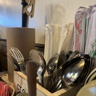 table number, utensils, sauces