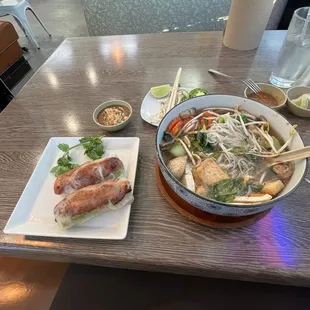 Tofu and veggie pho and grilled chicken summer roll.