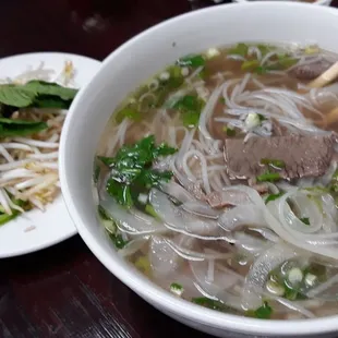 Medium size Beff and more beef Pho and their chili sauce goes super along with the bean sprouts. Thai basil leaves! Thank you !