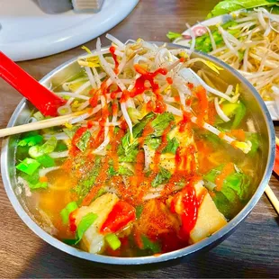 Tofu pho with egg noodles