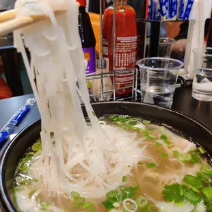 My cousin's pho... Noodle pull!