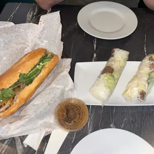 Grilled pork Banh mi and grilled pork spring rolls
