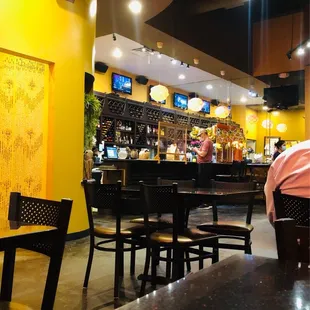a man sitting at a bar