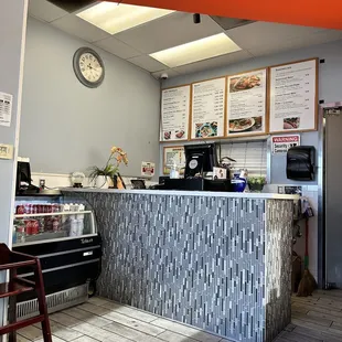 a view of a restaurant counter