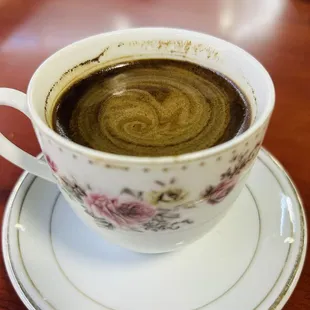 Turkish coffee. Was beautiful creama. But I stirred sugar in.