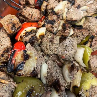 Combo Kebobs: Chicken, beef, and veggies grilled to smoky perfection with garlic sauce. Crowd favorite!