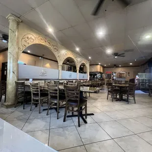 Inside decor and dining area, view from booths.