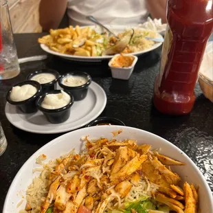 Chicken shawarma rice and Greek Salad