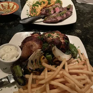 Sharhat Ghanam (Roast lamb loin) and Farrouj Meshwi (rotisserie chicken)