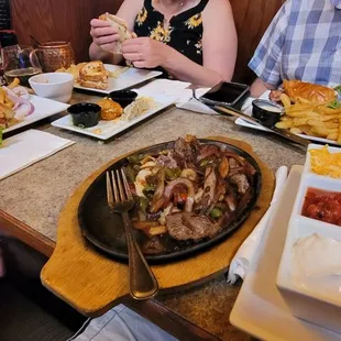 Phoenix fajitas (Shrimp and steak), Prime French Dip,DIP, The Cranberry Turkey, Bacon Cheeseburger... clockwise from bottom.