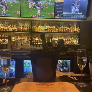 Champagne and football at the bar. Does it get any better?