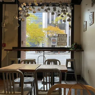 tables and chairs in a coffee shop
