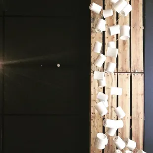 Window installation of hanging coffee mugs