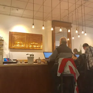 29 December 2018 - sit on stools at the order counter.