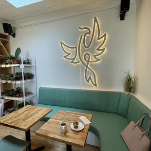 a green couch and a wooden table