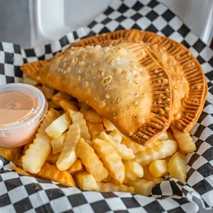 a plate of pastries and french fries