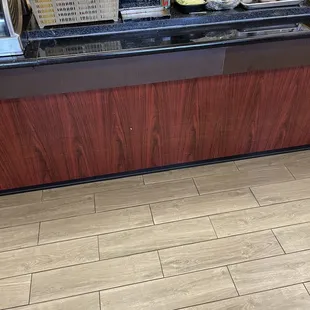 a view of the counter area of a restaurant